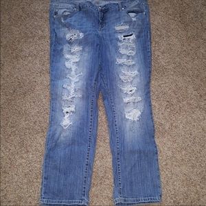 Woman’s distressed jeans